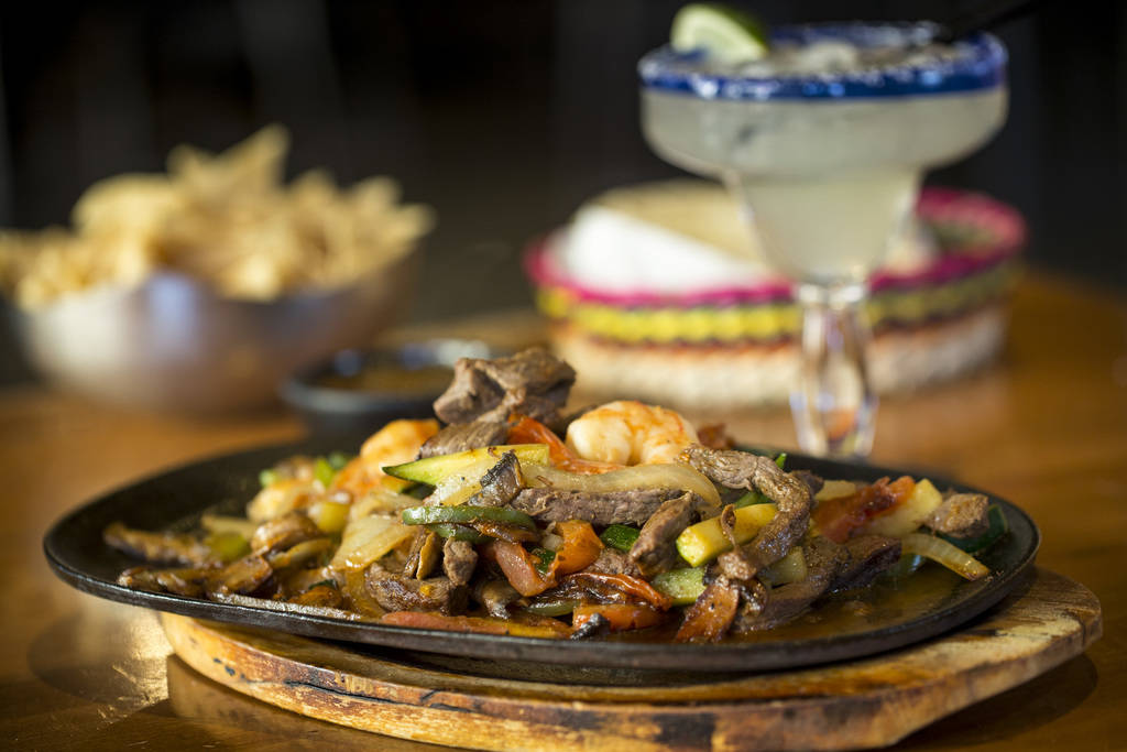 The carne asada and shrimp parillada (fajitas) served with chips and salsa and a traditional margarita at Leticia's Mexican Cocina located at Tivoli Village at Queensridge in Las Vegas on Monday,  ...
