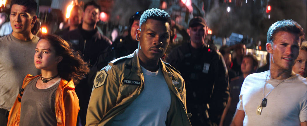John Boyega as Jake and Scott Eastwood as Lambert in "Pacific Rim Uprising."   (Universal Studios)