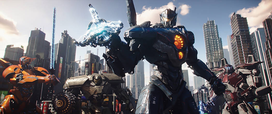 (L to R) Jaeger mechs Saber Athena, Bracer Phoenix, Gipsy Avenger and Guardian Bravo in "Pacific Rim Uprising."  The globe-spanning conflict between otherworldly monsters of mass destruction and t ...