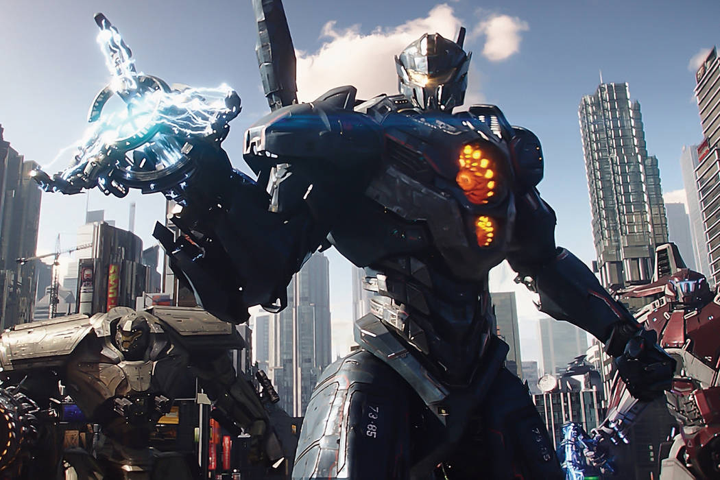 (L to R) Jaeger mechs Bracer Phoenix, Gipsy Avenger and Guardian Bravo in "Pacific Rim Uprising."  The globe-spanning conflict between otherworldly monsters of mass destruction and the human-pilot ...