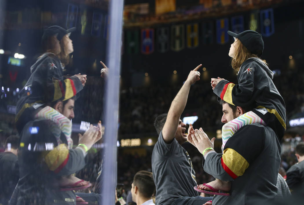 Golden Knights fans celebrate the team's 4-1 win over the Colorado Avalanche in an NHL hockey game at T-Mobile Arena in Las Vegas on Monday, March 26, 2018. Chase Stevens Las Vegas Review-Journal  ...