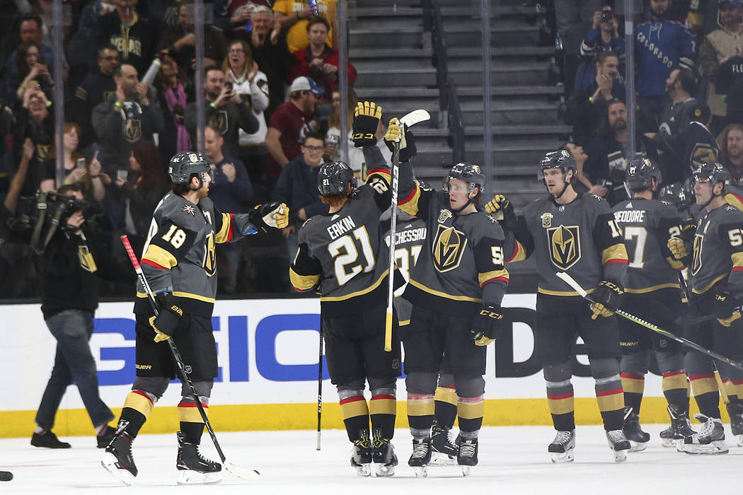Golden Knights players celebrate their 4-1 win over the Colorado Avalanche in an NHL hockey game at T-Mobile Arena in Las Vegas on Monday, March 26, 2018. Chase Stevens Las Vegas Review-Journal @c ...