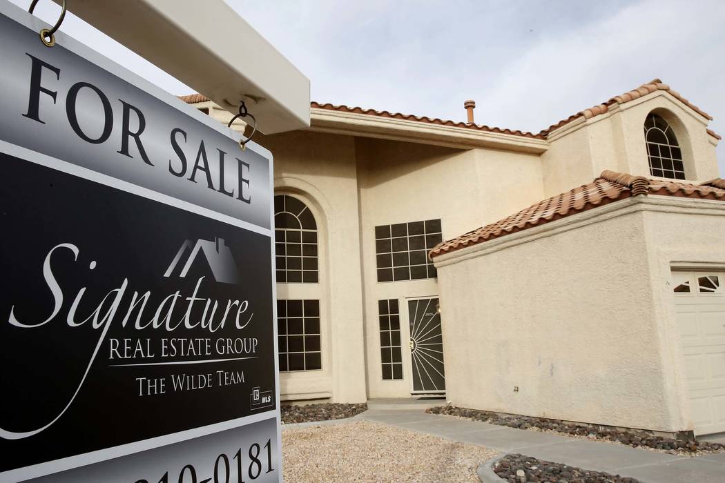 A for sale sign is displayed in front of a home at Gentle Bay Avenue near Windmill Lane Wednesday, Nov. 15, 2017, in Las Vegas. (Bizuayehu Tesfaye/Las Vegas Review-Journal) @bizutesfaye