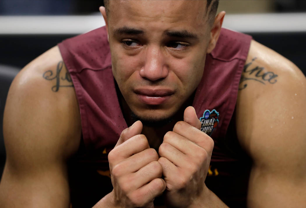 Loyola-Chicago's Marques Townes reacts after the semifinals of the Final Four NCAA college basketball tournament against Michigan, Saturday, March 31, 2018, in San Antonio. Michigan won 69-57. (AP ...