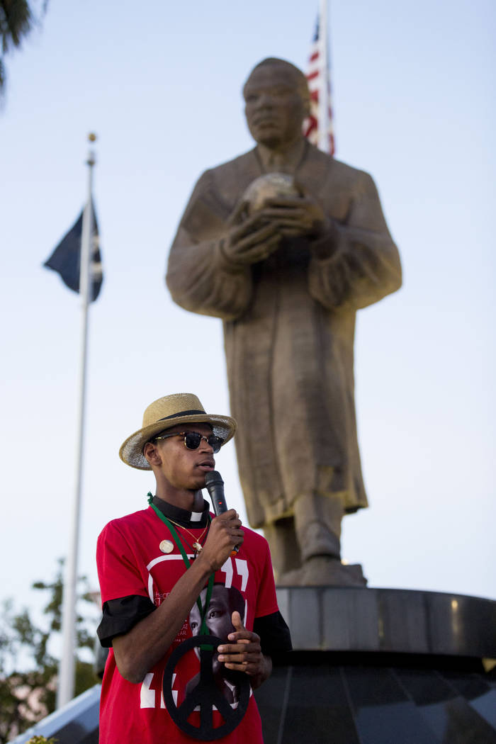 Stretch Sanders, of All Shades United Las Vegas, speaks during a vigil at the Martin Luther King Jr. statue in North Las Vegas on Aug. 13, 2017. (Elizabeth Brumley/Las Vegas Review-Journal)