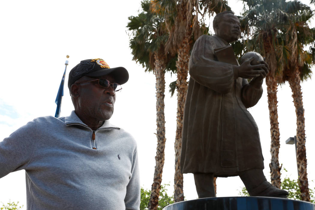 Eddie Ashley looks at the Martin Luther King Jr. statue near the intersection of Martin Luther King Boulevard and Carey Avenue in North Las Vegas on March 21, 2018. (Andrea Cornejo/Las Vegas Revie ...