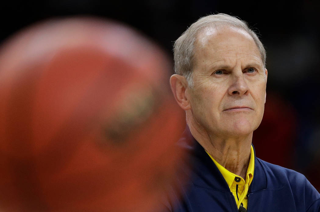 Michigan head coach John Beilein watches his team during a practice session for the Final Four NCAA college basketball tournament, Friday, March 30, 2018, in San Antonio. (AP Photo/David J. Phillip)