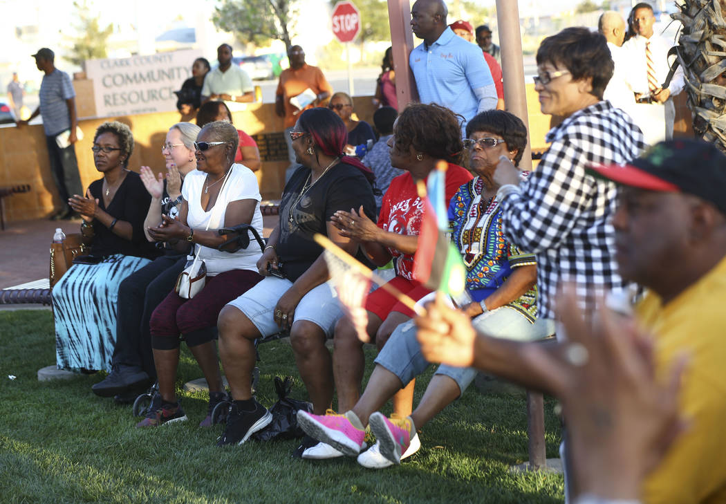 Attendees clap during a vigil held in honor of Dr. Martin Luther King Jr. at the statue made in his memory in North Las Vegas on Wednesday, April 4, 2018. Chase Stevens Las Vegas Review-Journal @c ...