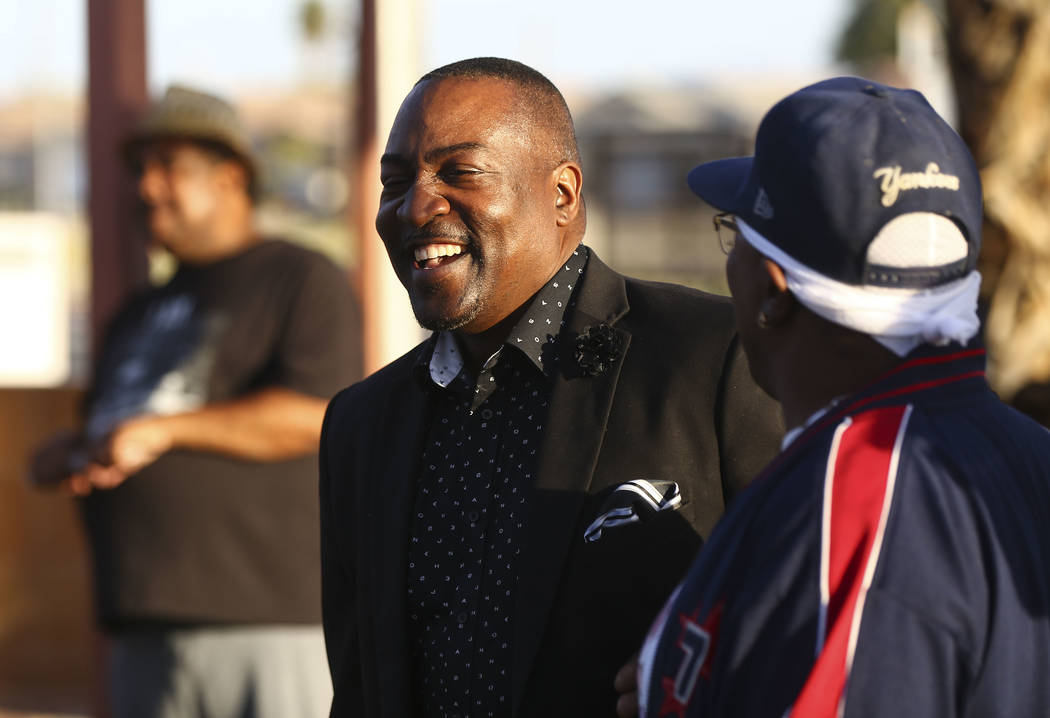 Nevada Assemblyman Tyrone Thompson, D-North Las Vegas, center, during a vigil held in honor of Dr. Martin Luther King Jr. at the statue made in his memory in North Las Vegas on Wednesday, April 4, ...