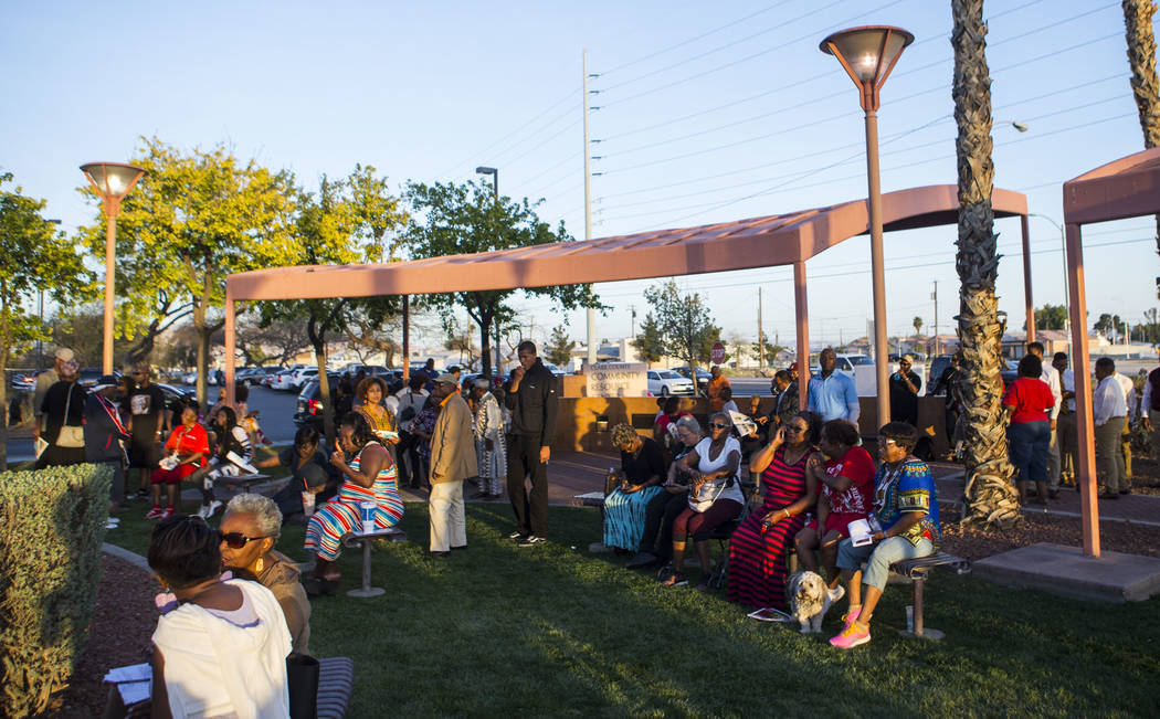 Attendees during a vigil held in honor of Dr. Martin Luther King Jr. at the statue made in his memory in North Las Vegas on Wednesday, April 4, 2018. Chase Stevens Las Vegas Review-Journal @csstev ...