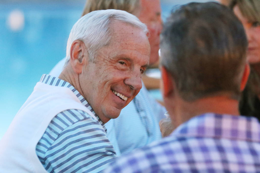 North Carolina coach Roy Williams, left, socializes during the 9th annual Coaches vs. Cancer Las Vegas Golf Classic hosted at MGM Grand Sunday, May 22, 2016, in Las Vegas. Ronda Churchill/Las Vega ...