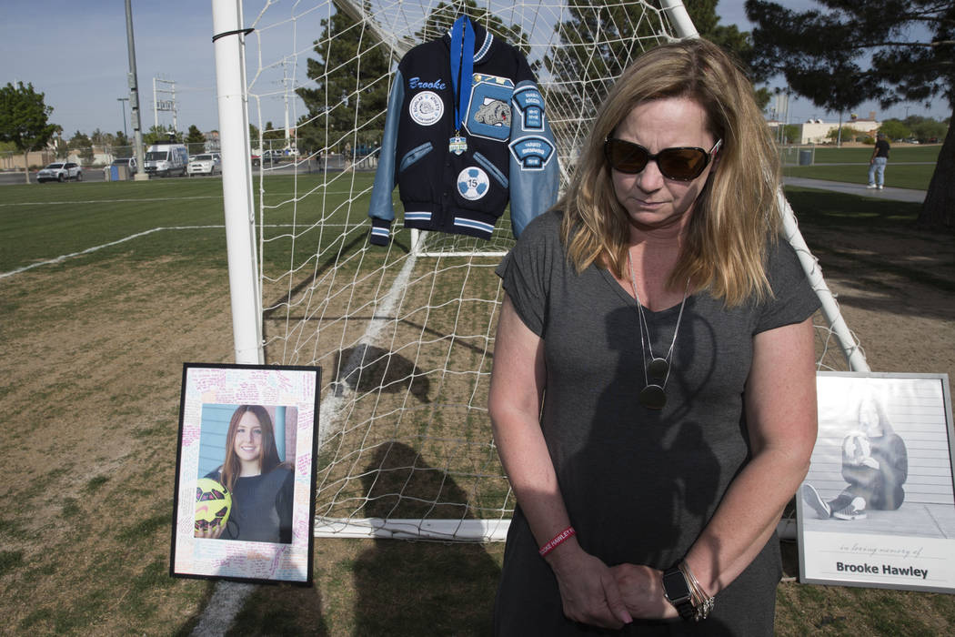 Rhonda Hawley pauses during an interview following a press conference announcing the Brooke Hawley Memorial Scholarship, at the Bettye Wilson Soccer Complex in Las Vegas, Tuesday, April 10, 2018.  ...