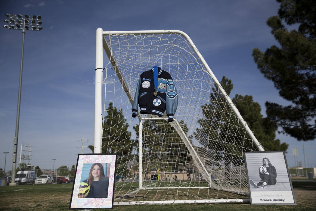 The letterman jacket and pictures of Brooke Hawley are displayed during a press conference announcing a memorial scholarship named after her at the Bettye Wilson Soccer Complex in Las Vegas, Tuesd ...