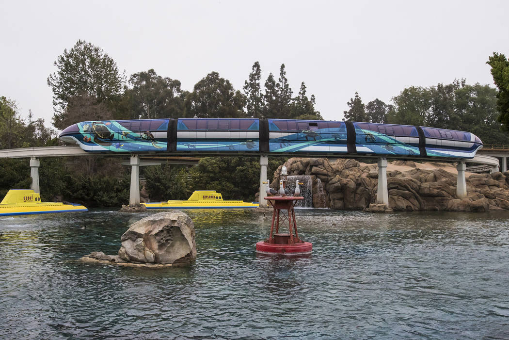 The Disneyland Monorail is zipping through the resort with a new Pixar-themed look to celebrate Pixar Fest! The blue train, inspired by Disney•Pixar’s “Finding Nemo,” features Crush and Sq ...