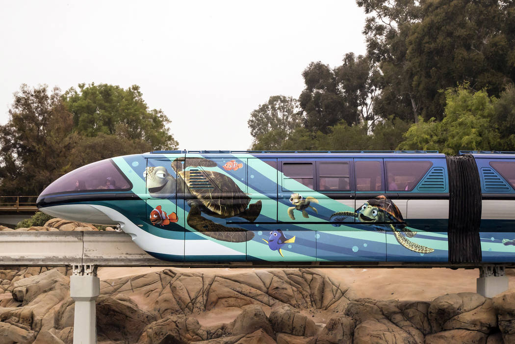 The Disneyland Monorail is zipping through the resort with a new Pixar-themed look to celebrate Pixar Fest! The blue train, inspired by Disney•Pixar’s “Finding Nemo,” features Crush and Sq ...
