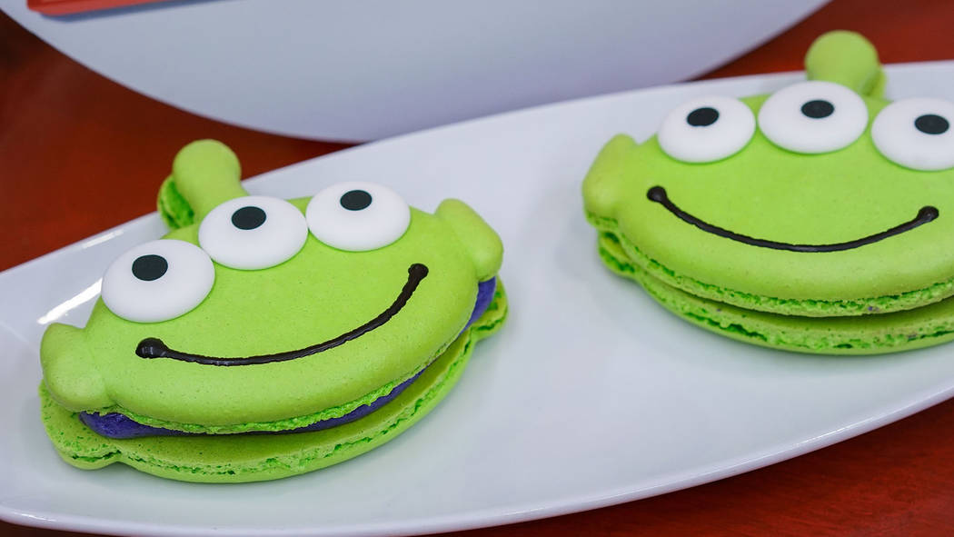 Favorite Pixar pals and stories are inspiring delicious treats, such as this alien macaroon in Tomorrowland at Disneyland park. (Disneyland Resort)