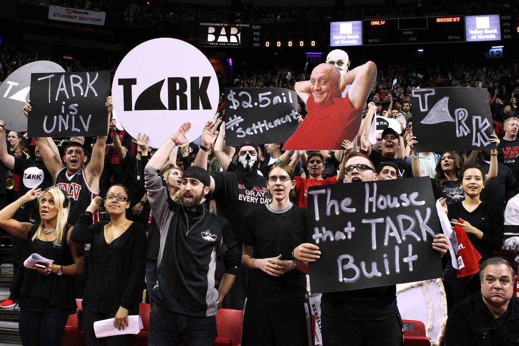 UNLV students hold signs in honor of former head coach Jerry Tarkanian before their game against Boise State Wednesday, Feb. 18, 2015, at the Thomas & Mack Center.  (Sam Morris/Las Vegas Revie ...
