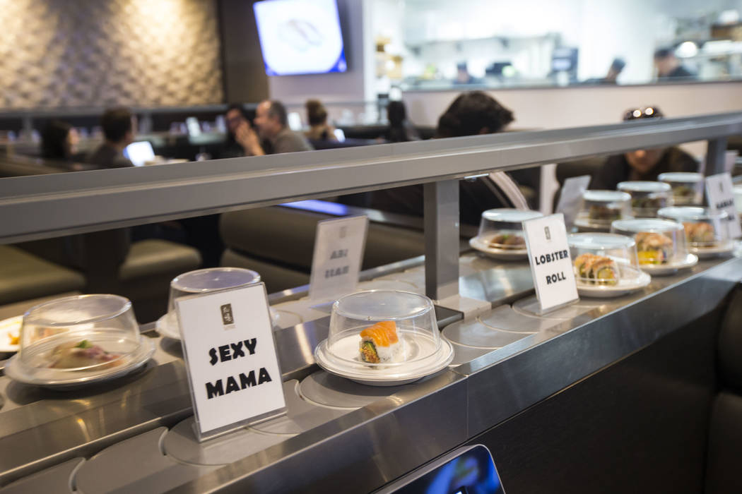 A Sexy Mama roll passes by on the conveyor belt at Sapporo Revolving Sushi in Las Vegas on Wednesday, April 25, 2018. Chase Stevens Las Vegas Review-Journal @csstevensphoto