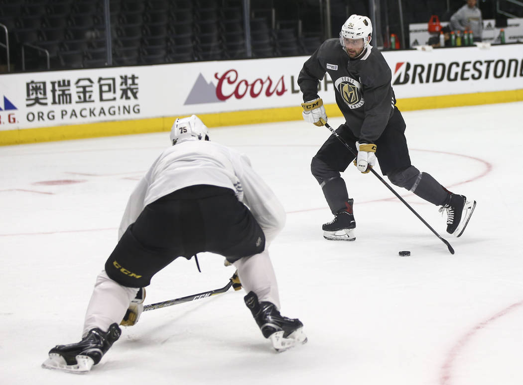 Golden Knights left wing Tomas Tatar (90) lines up a shot past right wing Ryan Reaves (75) during practice ahead of Game 4 against the Los Angeles Kings, slated for Tuesday, at the Staples Center ...