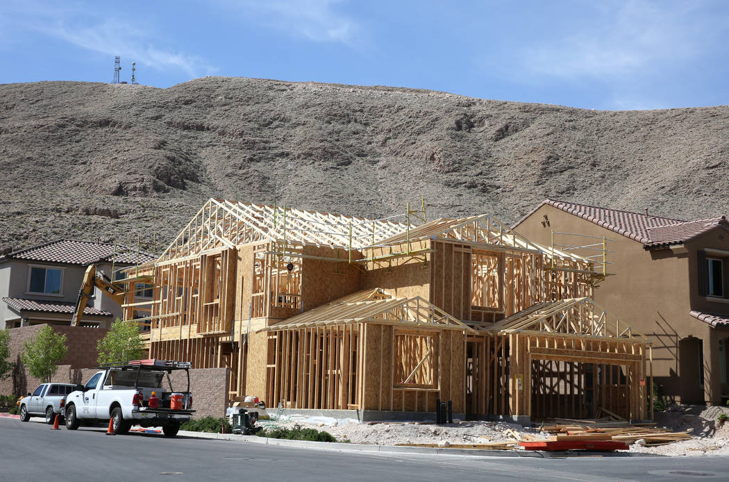 New homes under construction at the Cove at Southern Highlands and St. Rose parkways on Wednesday, April 18, 2018, in Las Vegas. Bizuayehu Tesfaye/Las Vegas Review-Journal @bizutesfaye