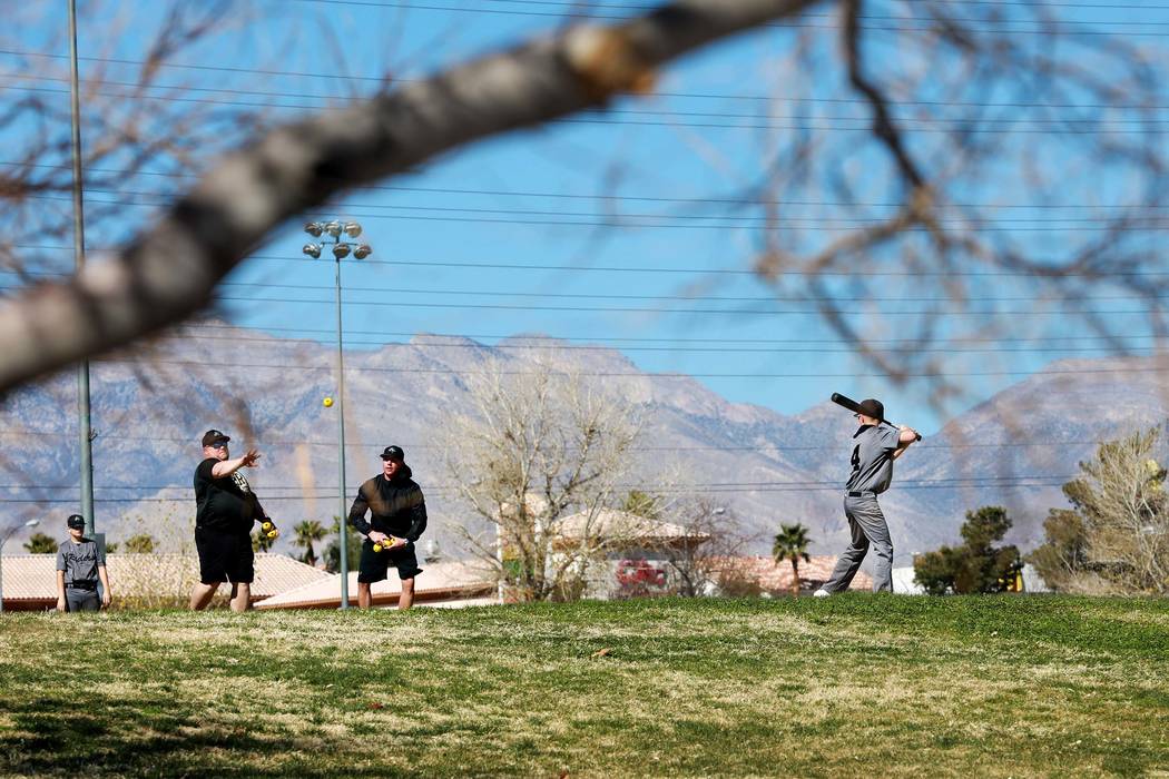 Patrons play baseball at Desert Breeze Park in Las Vegas on Sunday, Feb. 18, 2018. (Andrea Cornejo/Las Vegas Review-Journal) @DreaCornejo
