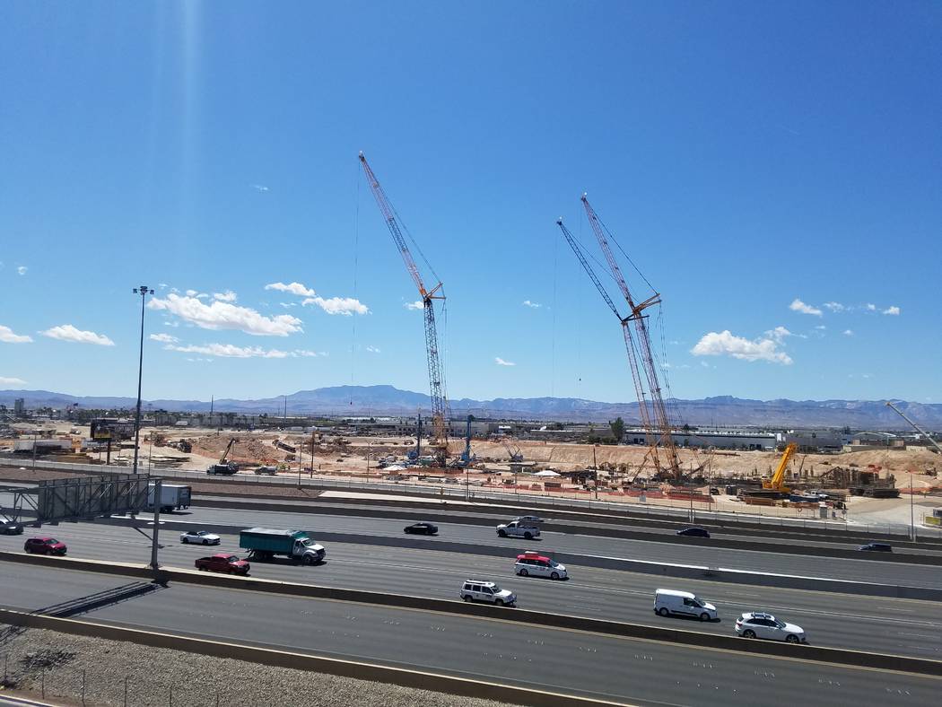 Three construction cranes tower over the Las Vegas Stadium construction site at Interstate 15 and Russell Road Friday, April 20, 2018. (Richard N. Velotta/Las Vegas Review-Journal)