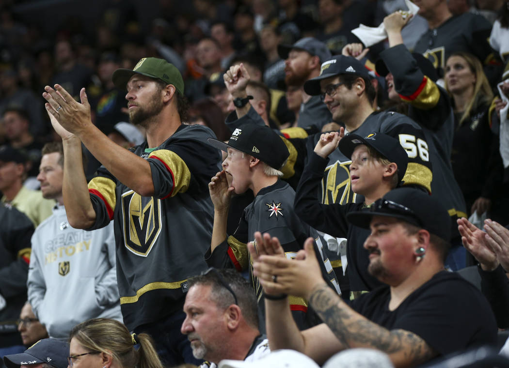 Golden Knights fans shout to Los Angeles Kings players during the second period of Game 1 of an NHL hockey first-round playoff series at T-Mobile Arena in Las Vegas on Wednesday, April 11, 2018. C ...