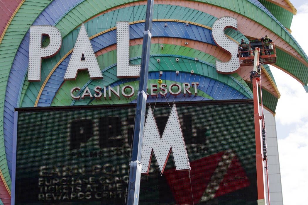 The Palms marquee sign on Flamingo Road in Las Vegas is removed, Tuesday, Feb. 13, 2018. Erik Verduzco Las Vegas Review-Journal @Erik_Verduzco
