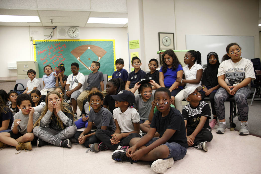 Students wait for Raiders players to speak to them at Gene Ward elementary school in Las Vegas, Wednesday, May 9, 2018. Students participated in a raiders themed drawing contest. Rachel Aston Las ...