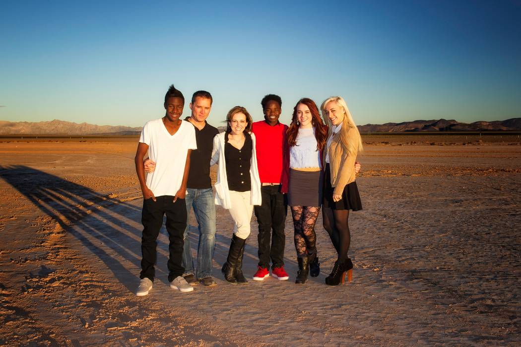The Rice family poses for a photo in 2013 at a dry lake bed outside Las Vegas. From left: Reagan Rice, Michael Rice, Cassie Rice, Becca Rice, Lauren Rice and Taylor Rice. Photo courtesy of Cassie ...