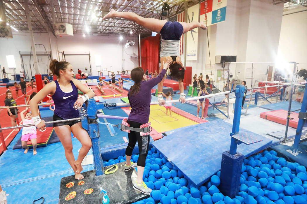 Coach Cassie Rice instructs several gymnasts at Gymcats, which she owns, in Henderson on Monday, May 7, 2018. Andrea Cornejo Las Vegas Review-Journal @dreacornejo