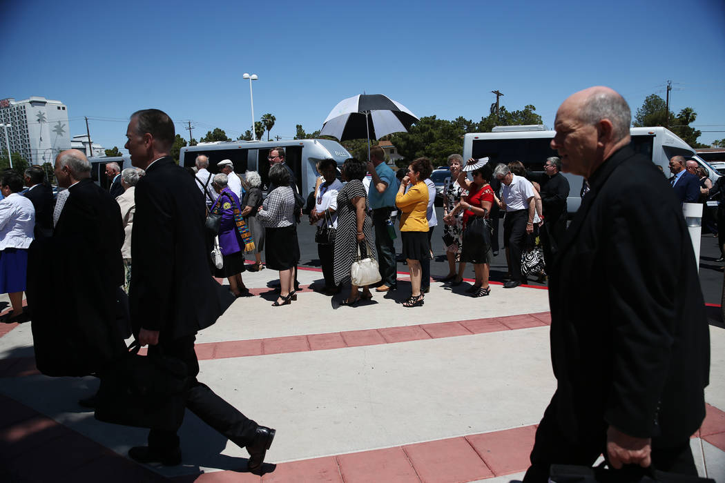 People wait in line to attend the installation of Rev. George Leo Thomas as the third Bishop of Las Vegas, at The Shrine of the Most Holy Redeemer in Las Vegas, Tuesday, May 15, 2018. Erik Verduzc ...