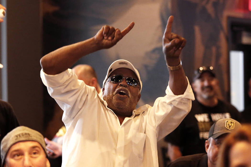 Greg Rhetta, of Las Vegas, cheers after the Vegas Golden Knights score against the Winnipeg Jet ...