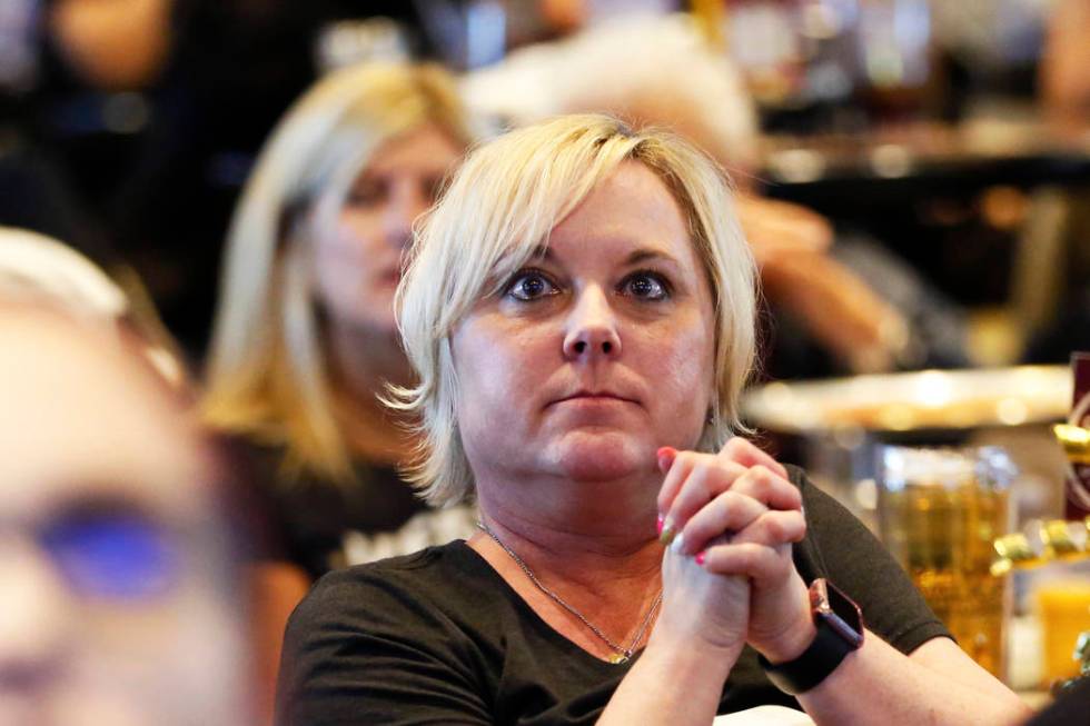 Holly Spicer, of Las Vegas, watches the Vegas Golden Knights play against the Winnipeg Jets dur ...