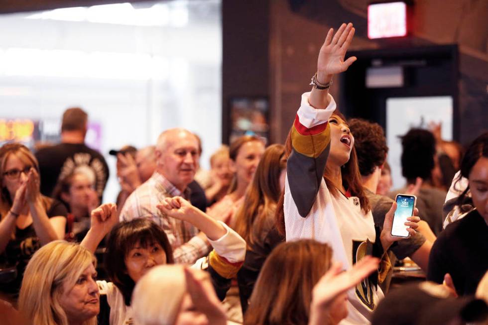 Vegas Golden Knight fans watch the the second game of the Western Conference Final against the ...