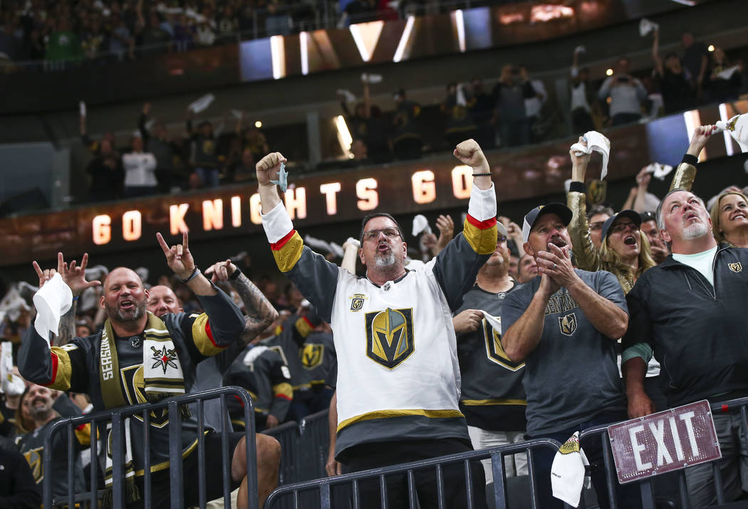 Golden Knights fans celebrate a goal by Erik Haula, not pictured, during the second period of Game 5 of an NHL hockey second-round playoff series against the San Jose Sharks at T-Mobile Arena in L ...