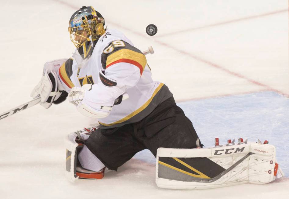 Golden Knights goaltender Marc-Andre Fleury (29) makes a save in the first period during game five of the NHL Western Conference Finals on Sunday, May 20, 2018, at Bell MTS Place, in Winnipeg, Can ...