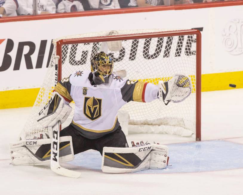 Golden Knights goaltender Marc-Andre Fleury (29) makes a save in the second period during game five of the NHL Western Conference Finals on Sunday, May 20, 2018, at Bell MTS Place, in Winnipeg, Ca ...