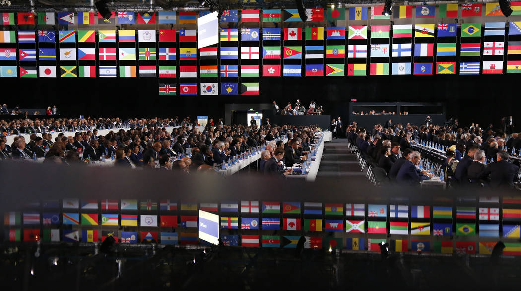 Delegates attend the FIFA congress on the eve of the opener of the 2018 soccer World Cup in Moscow, Russia, Wednesday, June 13, 2018. The congress in Moscow is set to choose the host or hosts for ...
