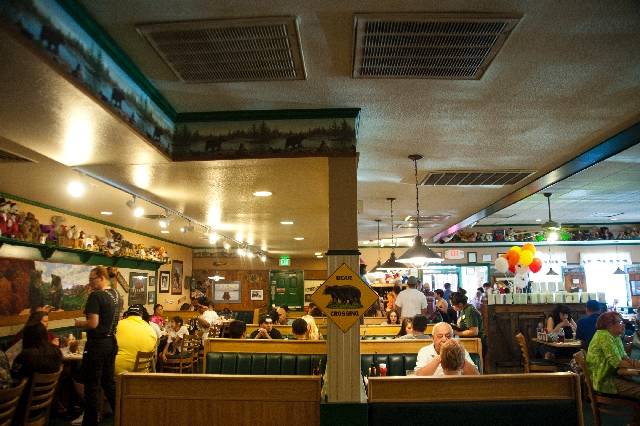 Patrons eat at Black Bear Diner, which knows how to serve a big breakfast, especially the chick ...