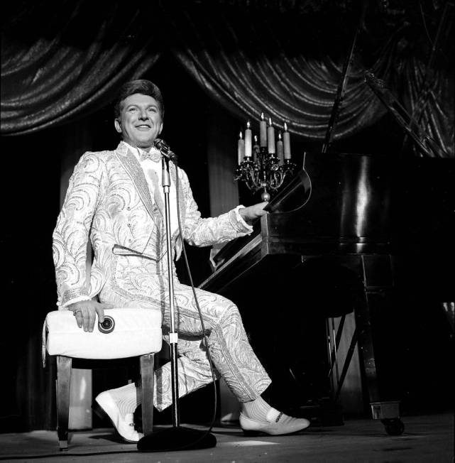 Liberace opening at the Sahara hotel-casino with Karen Wessler 1966. (Las Vegas News Bureau)