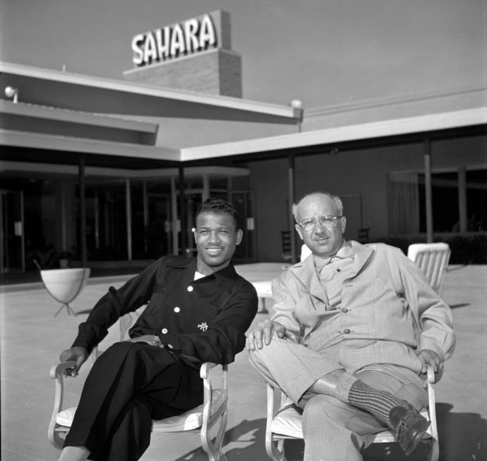 Sugar Ray Robinson and Milton Prell casino owner and developer sit at the Sahara hotel-casino i ...