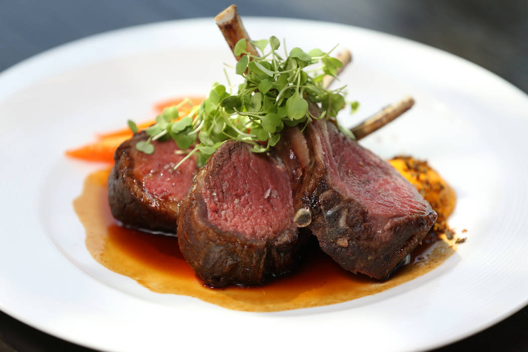 The roasted rack of lamb is served with vadouvan carrots, bloomsdale spinach and harissa lamb jus, at Gordon Ramsay Hell's Kitchen in Las Vegas, Tuesday, July 17, 2018. Erik Verduzco Las Vegas Rev ...