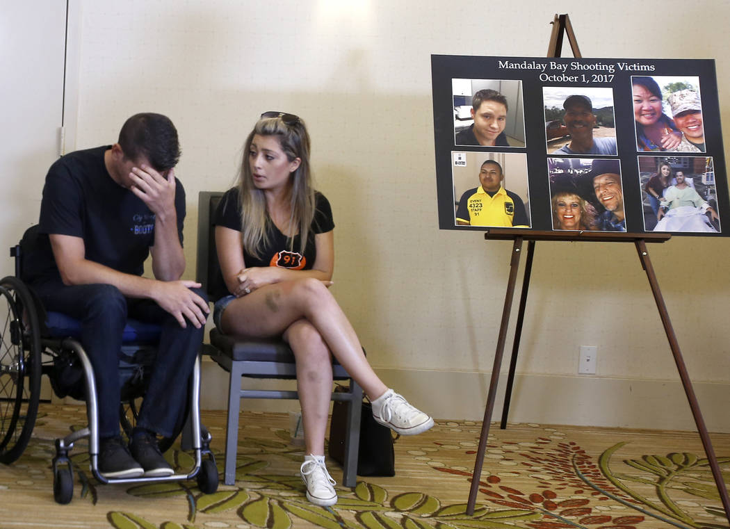 Fiorella Gaeta consoles her fiance, Jason McMillan, 36, of Riverside, a Riverside County Sheriff's deputy who was shot and paralyzed in the Oct, 1, 2017, Las Vegas shooting, reacts after he talks ...