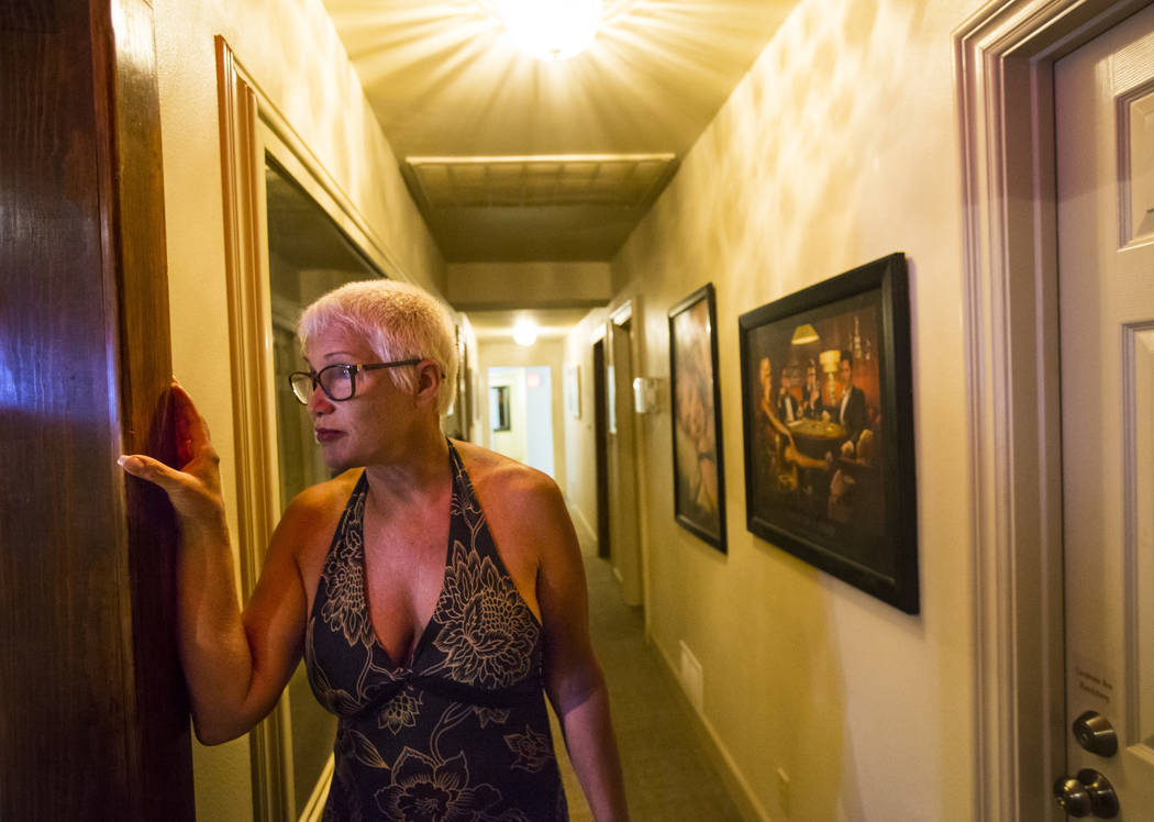 Sonja Bandolik, the " Madam on the Menu," stands in a hallway at the Love Ranch broth ...
