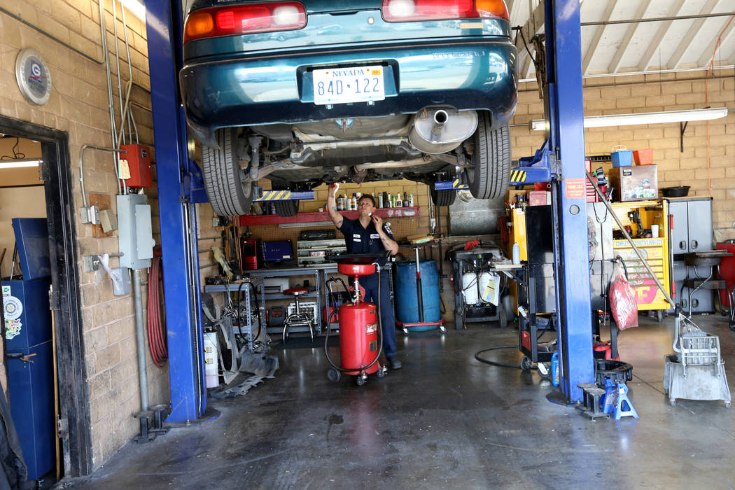 Mechanic Cody Surratt works on a car at Auto Specialists at 705 Juniper Way in Boulder City Wednesday, Aug. 1, 2018. K.M. Cannon Las Vegas Review-Journal @KMCannonPhoto