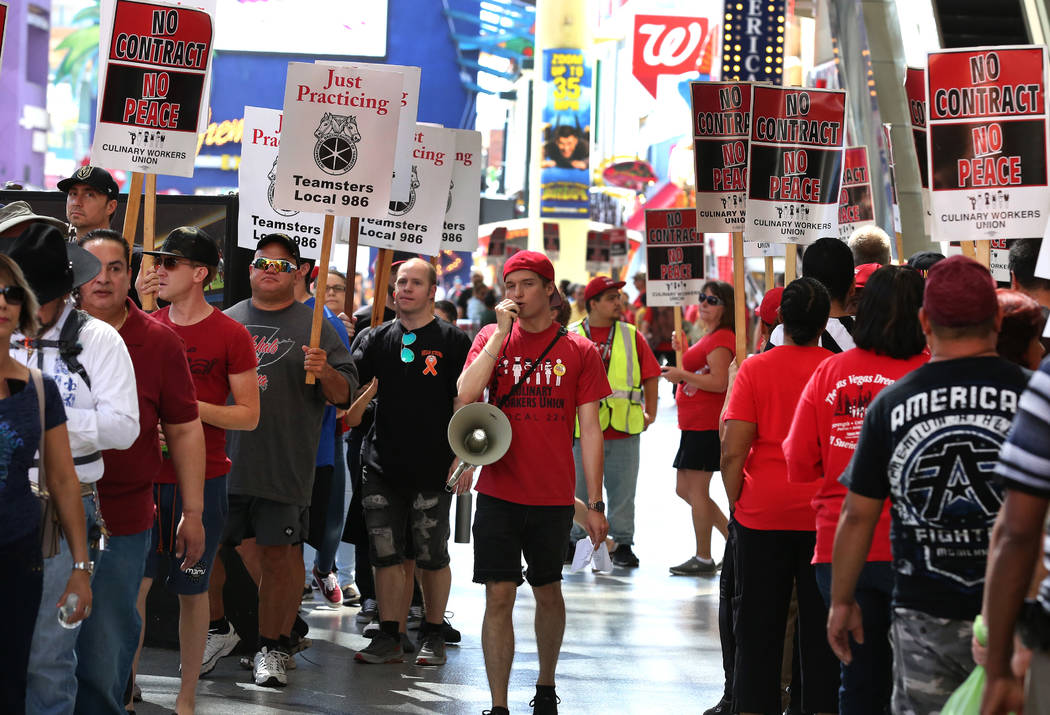 Paul Catha shouts slogans as Culinary Union members picket in front of the D Las Vegas on Friday, July 6, 2018, in downtown. (Bizuayehu Tesfaye/Las Vegas Review-Journal) @bizutesfaye