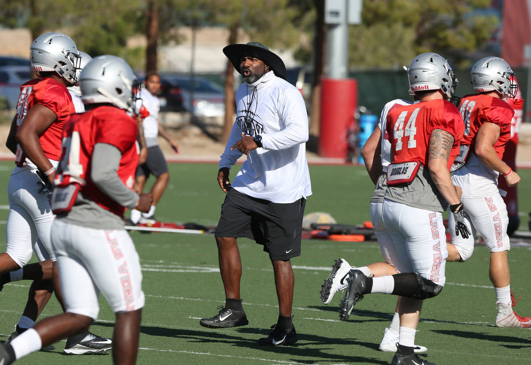 Travis Burkett, UNLV director of football strength and conditioning, instructs his players during team practice on Tuesday, Aug. 21, 2018, in Las Vegas. (Bizuayehu Tesfaye/Las Vegas Review-Journal ...