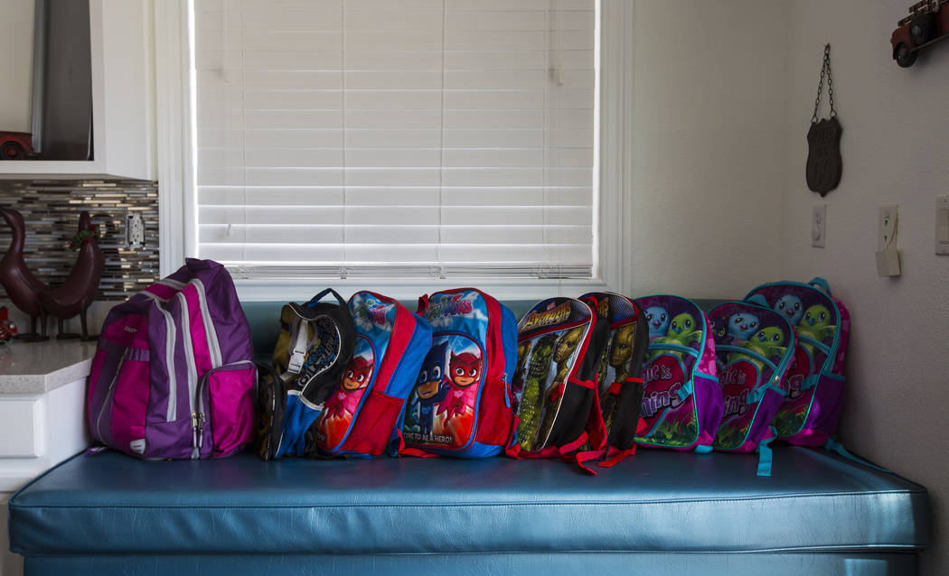 Backpacks belonging to the children of Deon Derrico at their home in North Las Vegas on Wednesd ...