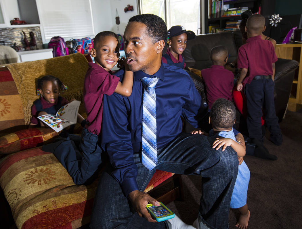 Deon Derrico talks to his son Deniko, 4, at their home in North Las Vegas on Wednesday, Aug. 15 ...
